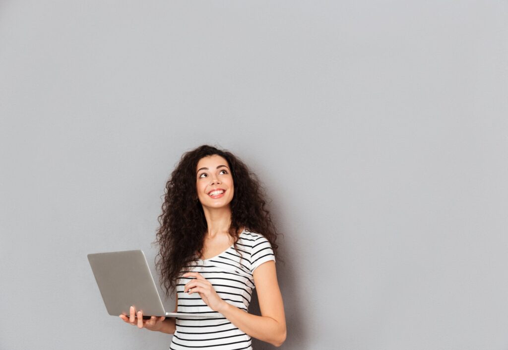person holding a laptop