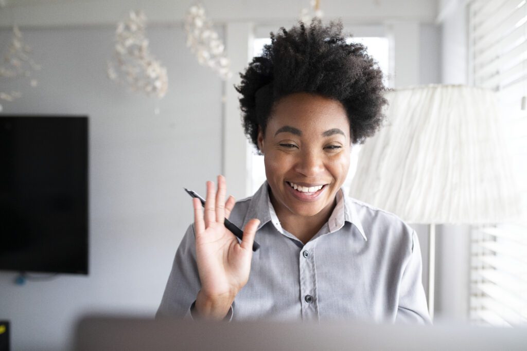Woman having an online class studying through e-learning system